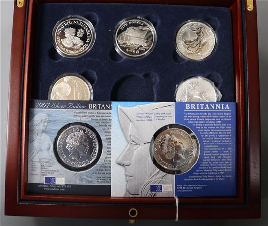 Royal Mint silver proof coins to include - in an associated case